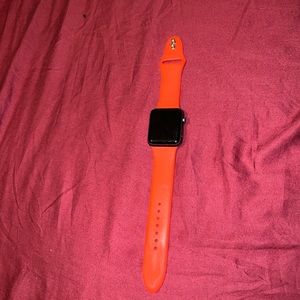 Apple Watch Series 3. 42mm. Comes with a charger